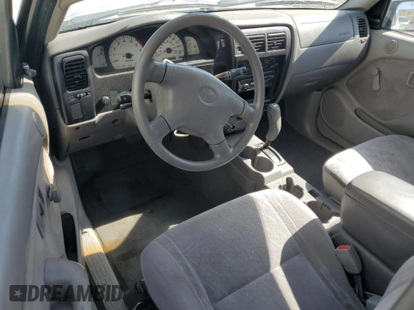 2002 Toyota Tacoma z VIN 5TEVL52N72Z007081, wystawiony jako Copart lot #52008995 z przebiegiem 218 910 mil mil oraz Szkoda całkowita • Salvage title. Historia ofert i sprzedaży dostępna na DreamBid. Obrazek 8.