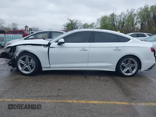 2022 Audi A5 Sportback S line Premium Plus z VIN WAUFACF57NA033636, wystawiony jako IAAI lot #41947545 z przebiegiem 75 797 mil mil oraz . Historia ofert i sprzedaży dostępna na DreamBid. Obrazek 15.