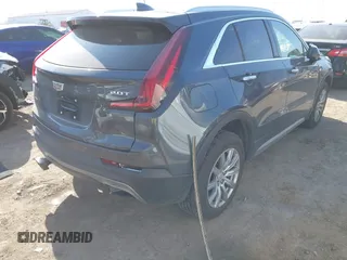 2019 Cadillac XT4 AWD Premium Luxury with VIN 1GYFZDR44KF197830, listed as a IAAI auction lot 41795431 with 54,106 mi miles and . Bid and sale history available at DreamBid. Image 4.