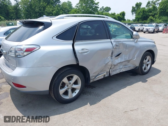 2012 Lexus RX 350 with VIN 2T2BK1BA5CC129386, listed as a IAAI auction lot 42503827 with 123,554 mi miles and . Bid and sale history available at DreamBid. Image 4.