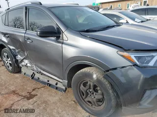 2018 Toyota RAV4 LE with VIN JTMZFREV4JJ183106, listed as a IAAI auction lot 41449468 with 114,719 mi miles. Bid and sale history available at carsss.com. Image 6.