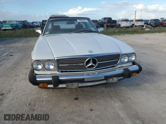 1989 Mercedes-Benz 560 SL z VIN WDBBA48DXKA096297, wystawiony jako Copart lot #75597074 z przebiegiem 70 152 mil mil oraz Szkoda całkowita • Salvage title. Historia ofert i sprzedaży dostępna na DreamBid. Obrazek 5.