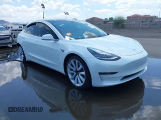 2020 Tesla Model 3 Long Range z VIN 5YJ3E1EB4LF621455, wystawiony jako IAAI lot #42415252 z przebiegiem 81 156 mil mil oraz . Historia ofert i sprzedaży dostępna na DreamBid. Obrazek 1.