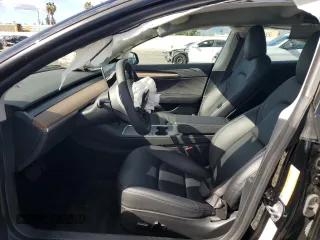 2023 Tesla Model 3 z VIN 5YJ3E1EA3PF713735, wystawiony jako Copart lot #51821995 z przebiegiem Nie podano mil oraz Szkoda całkowita • Salvage title. Historia ofert i sprzedaży dostępna na DreamBid. Obrazek 7.