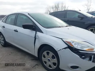 2013 Ford Focus S with VIN 1FADP3E20DL332636, listed as a IAAI auction lot 40917274 with 112,956 mi miles. Bid and sale history available at carsss.com. Image 13.