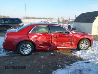 2012 Chrysler 300 Limited with VIN 2C3CCACG0CH205728, listed as a IAAI auction lot 41285693 with 125,204 mi miles. Bid and sale history available at carsss.com. Image 13.