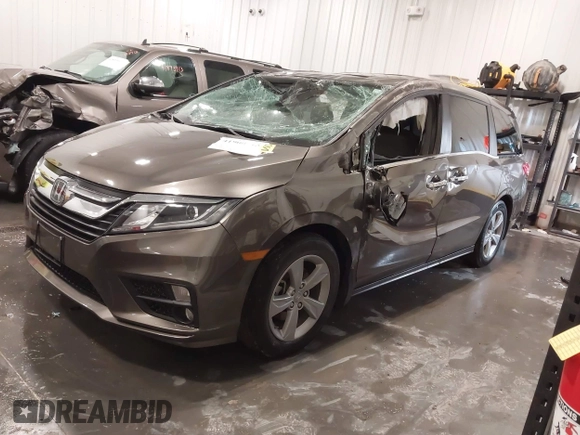 2019 Honda Odyssey EX-L with VIN 5FNRL6H73KB135075, listed as a IAAI auction lot 41908515 with 61,426 mi miles. Bid and sale history available at carsss.com. Image 2.