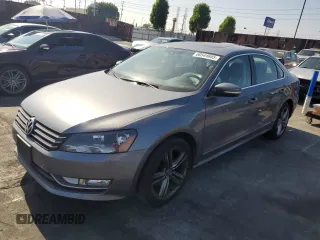 2015 Volkswagen Passat SE with VIN 1VWBT7A3XFC075794, listed as a Copart auction lot 60544605 with 99,320 mi miles and Salvage title. Bid and sale history available at DreamBid. Image 1.