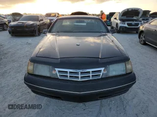 1988 Ford Thunderbird with VIN 1FABP60F9JH246775, listed as a Copart auction lot 77428264 with Not Provided miles and Salvage Title. Bid and sale history available at DreamBid. Image 5.