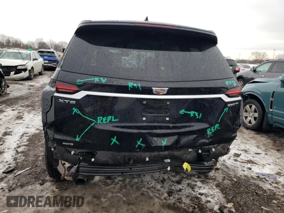 2023 Cadillac XT6 AWD Luxury z VIN 1GYKPBR45PZ159666, wystawiony jako Copart lot #39370954 z przebiegiem 12 778 mil mil oraz . Historia ofert i sprzedaży dostępna na DreamBid. Obrazek 6.