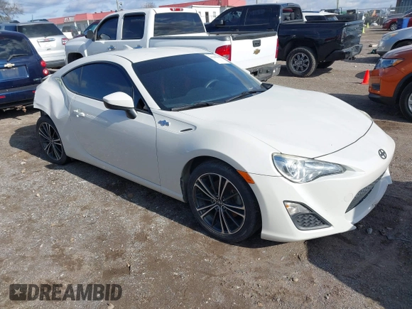 2015 Scion FR-S with VIN JF1ZNAA13F8707454, listed as a IAAI auction lot 41239233 with 130,126 mi miles. Bid and sale history available at carsss.com. Image 1.
