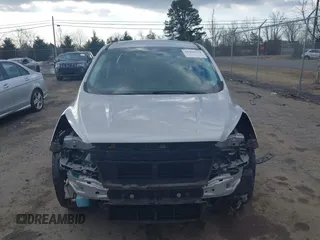 2017 Ford Escape SE z VIN 1FMCU9GDXHUA46689, wystawiony jako IAAI lot #41492523 z przebiegiem 67 401 mil mil oraz . Historia ofert i sprzedaży dostępna na DreamBid. Obrazek 12.