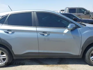2021 Hyundai Kona SE with VIN KM8K12AA0MU646822, listed as a IAAI auction lot 41884489 with 86,916 mi miles and . Bid and sale history available at DreamBid. Image 13.