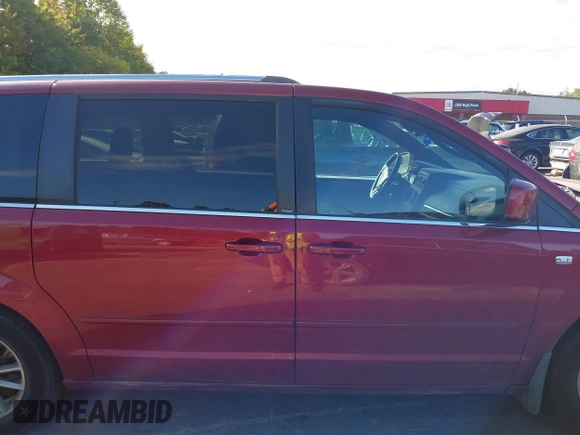 2014 Dodge Grand Caravan SXT with VIN 2C4RDGCG8ER311850, listed as a IAAI auction lot 40598088 with 138,010 mi miles and . Bid and sale history available at DreamBid. Image 13.