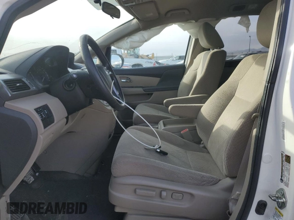 2016 Honda Odyssey SE with VIN 5FNRL5H39GB070652, listed as a Copart auction lot 46358775 with 135,921 mi miles and Salvage Title. Bid and sale history available at DreamBid. Image 7.