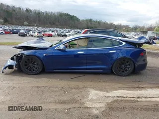 2017 Tesla Model S 100D with VIN 5YJSA1E27HF220982, listed as a IAAI auction lot 41731047 with Not Provided miles and . Bid and sale history available at DreamBid. Image 14.