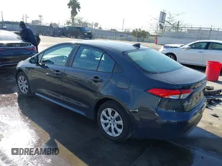 2023 Toyota Corolla LE with VIN 5YFB4MDE5PP014910, listed as a IAAI auction lot 41860905 with 40,517 mi miles. Bid and sale history available at carsss.com. Image 3.