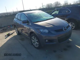 2007 Mazda CX-7 Grand Touring with VIN JM3ER293370141358, listed as a IAAI auction lot 41757729 with 126,077 mi miles. Bid and sale history available at carsss.com. Image 1.