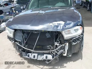 2014 Dodge Durango Limited with VIN 1C4RDHDG6EC975934, listed as a IAAI auction lot 42416833 with 158,266 mi miles and . Bid and sale history available at DreamBid. Image 6.