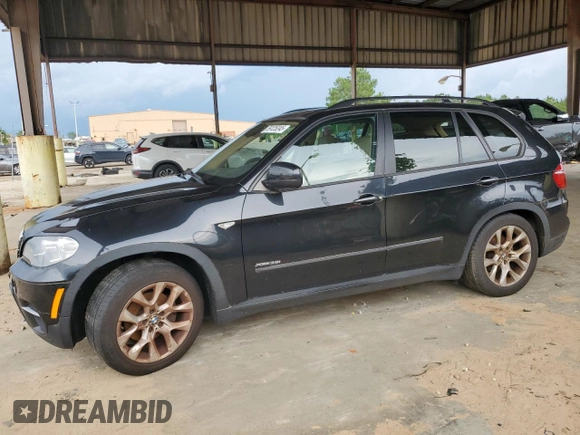 2012 BMW X5 35i with VIN 5UXZV4C54CL990112, listed as a Copart auction lot 59125245 with 142,742 mi miles and Clean title. Bid and sale history available at DreamBid. Image 1.