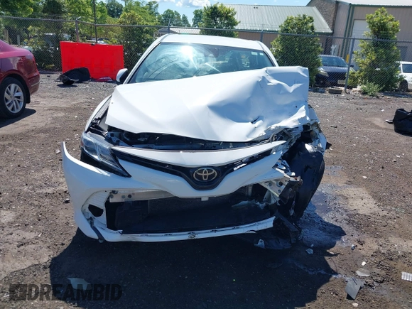 2019 Toyota Camry LE with VIN 4T1B11HK2KU187475, listed as a IAAI auction lot 42192293 with 44,413 mi miles and . Bid and sale history available at DreamBid. Image 12.