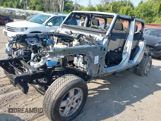 2022 Jeep Gladiator Willys with VIN 1C6HJTAG0NL131004, listed as a IAAI auction lot 40307060 with Not provided miles and . Bid and sale history available at DreamBid. Image 18.