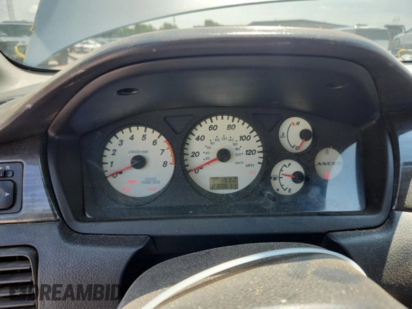 2004 Mitsubishi Lancer z VIN JA3AD29F34U045488, wystawiony jako Copart lot #61493005 z przebiegiem 230 611 mil mil oraz Czysty tytuł • Clean title. Historia ofert i sprzedaży dostępna na DreamBid. Obrazek 9.