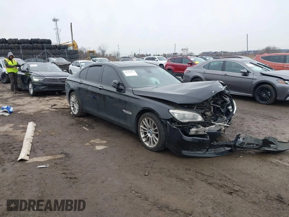 2015 BMW 7 Series 750i xDrive with VIN WBAYB6C59FD965820, listed as a IAAI auction lot 41558215 with 142,617 mi miles. Bid and sale history available at carsss.com. Image 1.
