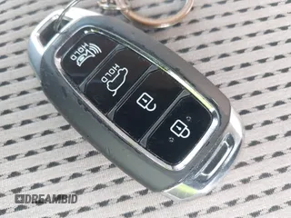 2019 Hyundai Santa Fe SEL Plus z VIN 5NMS33AD0KH023929, wystawiony jako IAAI lot #42103232 z przebiegiem 59 714 mil mil oraz . Historia ofert i sprzedaży dostępna na DreamBid. Obrazek 11.