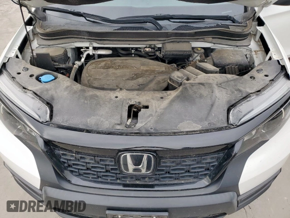 2020 Honda Passport EX-L with VIN 5FNYF7H57LB002957, listed as a Copart auction lot 51022825 with 74,868 mi miles and Salvage Title. Bid and sale history available at DreamBid. Image 12.