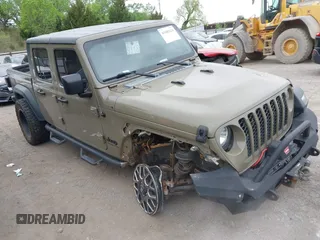 2020 Jeep Gladiator Sport S z VIN 1C6HJTAG6LL194671, wystawiony jako IAAI lot #41985124 z przebiegiem 132 290 mil mil oraz . Historia ofert i sprzedaży dostępna na DreamBid. Obrazek 1.
