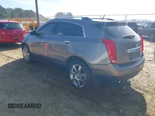 2012 Cadillac SRX Performance Collection with VIN 3GYFNBE3XCS565616, listed as a IAAI auction lot 41835476 with 141,259 mi miles. Bid and sale history available at carsss.com. Image 3.