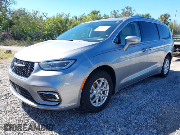 2021 Chrysler Pacifica Touring L with VIN 2C4RC1BG3MR560234, listed as a IAAI auction lot 40926673 with 27,830 mi miles and . Bid and sale history available at DreamBid. Image 2.
