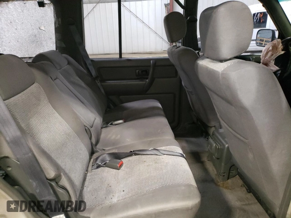 1998 Isuzu Trooper S with VIN JACDJ58X2W7916707, listed as a Copart auction lot 54154335 with 167,433 mi miles and Salvage title. Bid and sale history available at DreamBid. Image 11.