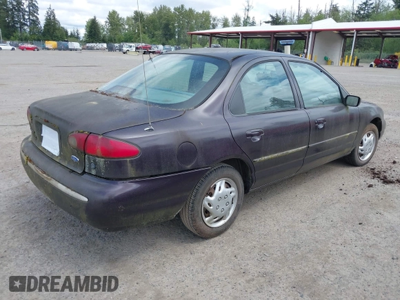 1995 Ford Contour z VIN 3FALP6633SM116313, wystawiony jako IAAI lot #42058920 z przebiegiem 192 905 mil mil oraz . Historia ofert i sprzedaży dostępna na DreamBid. Obrazek 4.