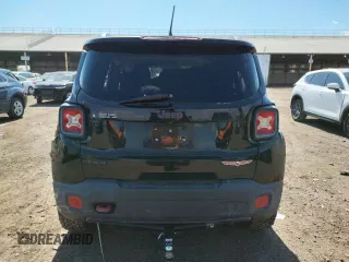 2015 Jeep Renegade Trailhawk z VIN ZACCJBCT9FPB21561, wystawiony jako Copart lot #63051673 z przebiegiem Nie podano mil oraz Szkoda całkowita • Salvage title. Historia ofert i sprzedaży dostępna na DreamBid. Obrazek 6.