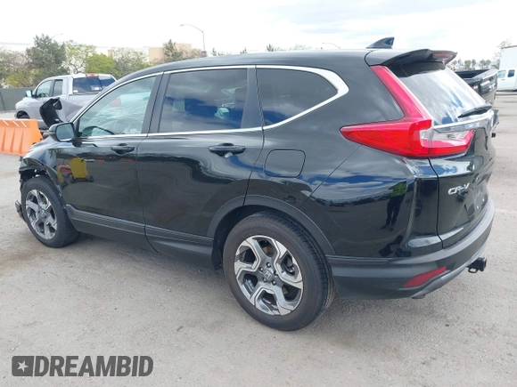 2019 Honda CR-V EX with VIN 5J6RW1H56KA030445, listed as a IAAI auction lot 42043513 with 137,087 mi miles. Bid and sale history available at carsss.com. Image 3.