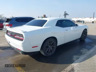 2019 Dodge Challenger GT z VIN 2C3CDZJG7KH503920, wystawiony jako IAAI lot #41604967 z przebiegiem 93 829 mil mil oraz . Historia ofert i sprzedaży dostępna na DreamBid. Obrazek 4.