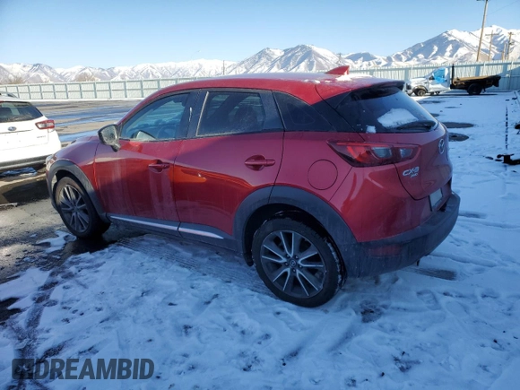 2016 Mazda CX-3 Grand Touring with VIN JM1DKBD78G0113185, listed as a Copart auction lot 42802145 with 158,068 mi miles and Salvage Title. Bid and sale history available at DreamBid. Image 2.