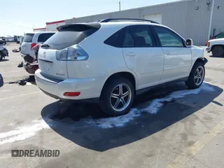 2004 Lexus RX 330 with VIN JTJGA31U840034009, listed as a IAAI auction lot 42004638 with 252,942 mi miles. Bid and sale history available at carsss.com. Image 4.