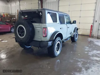 2022 Ford Bronco with VIN 1FMDE5DH1NLB65525, listed as a IAAI auction lot 41370356 with 20,311 mi miles. Bid and sale history available at carsss.com. Image 4.