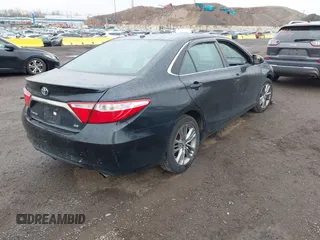 2015 Toyota Camry XLE with VIN 4T1BF1FK1FU087653, listed as a IAAI auction lot 41942940 with 180,274 mi miles. Bid and sale history available at carsss.com. Image 4.