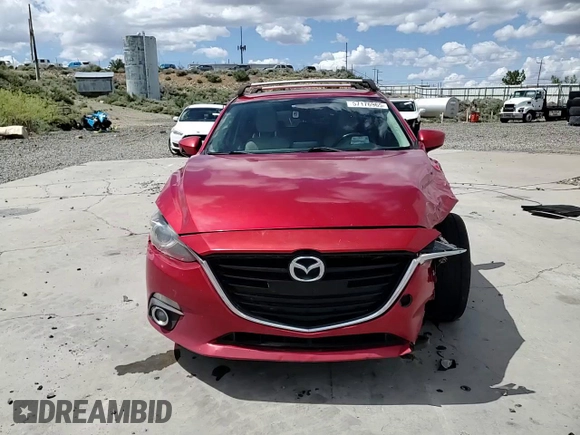 2014 Mazda 3 S Grand Touring z VIN JM1BM1M37E1187794, wystawiony jako Copart lot #57176965 z przebiegiem 183 166 mil mil oraz Szkoda całkowita • Salvage title. Historia ofert i sprzedaży dostępna na DreamBid. Obrazek 14.