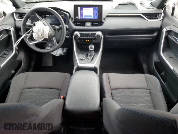 2023 Toyota RAV4 Hybrid SE with VIN JTM16RFV7PD100111, listed as a Copart auction lot 56682135 with 32,198 mi miles and Salvage title. Bid and sale history available at DreamBid. Image 8.
