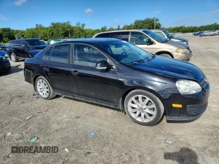 2010 Volkswagen Jetta Wolfsburg Edition with VIN 3VWRJ7AJ5AM046732, listed as a Copart auction lot 62901815 with 175,863 mi miles and Salvage title. Bid and sale history available at DreamBid. Image 4.