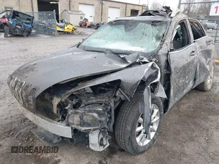 2015 Jeep Cherokee Limited with VIN 1C4PJMDSXFW688254, listed as a IAAI auction lot 41937322 with 107,935 mi miles. Bid and sale history available at carsss.com. Image 6.