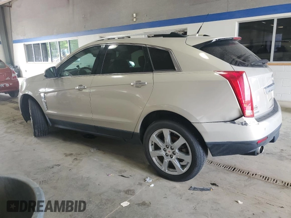 2012 Cadillac SRX Performance Collection with VIN 3GYFNBE31CS518975, listed as a Copart auction lot 51928865 with 152,449 mi miles and Clean Title. Bid and sale history available at carsss.com. Image 2.