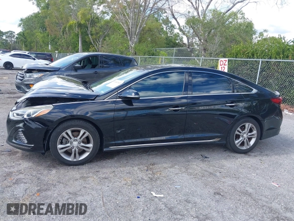 2018 Hyundai Sonata SEL with VIN 5NPE34AF3JH647018, listed as a IAAI auction lot 41687419 with 97,561 mi miles and . Bid and sale history available at DreamBid. Image 14.