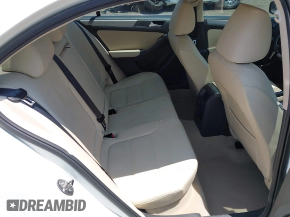 2014 Volkswagen Jetta TDI w/Premium/Nav with VIN 3VWLL7AJXEM366828, listed as a IAAI auction lot 42392563 with 132,924 mi miles and . Bid and sale history available at DreamBid. Image 8.