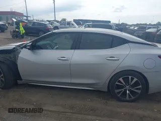 2016 Nissan Maxima SV with VIN 1N4AA6AP2GC379890, listed as a IAAI auction lot 42744808 with 91,590 mi miles and . Bid and sale history available at DreamBid. Image 13.